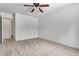 Bright bedroom with neutral carpeting and ceiling fan at 13626 E Bates Ave # 207, Aurora, CO 80014