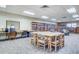 Community library with ample seating and books at 13626 E Bates Ave # 207, Aurora, CO 80014