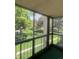 Enjoy the beautiful outdoor view from this lovely screened-in porch at 13626 E Bates Ave # 207, Aurora, CO 80014