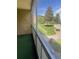 Enjoy the beautiful outdoor view from this lovely screened-in porch at 13626 E Bates Ave # 207, Aurora, CO 80014