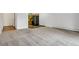 Spacious living room with neutral carpeting at 13626 E Bates Ave # 207, Aurora, CO 80014