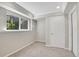 Basement featuring a window for natural light and neutral color carpet and walls, providing a calming space at 8848 Prickly Pear Cir, Parker, CO 80134