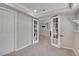 Finished basement with soft gray carpet and walls, along with a set of french doors leading to another room at 8848 Prickly Pear Cir, Parker, CO 80134