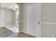 Welcoming foyer showcasing neutral paint, and direct access to the dining area, and adjacent living spaces at 8848 Prickly Pear Cir, Parker, CO 80134