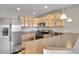 Modern kitchen with stainless steel appliances, stylish cabinetry, and ample counter space at 8848 Prickly Pear Cir, Parker, CO 80134