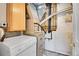 Functional utility room featuring modern washer, dryer, and mechanical systems at 8848 Prickly Pear Cir, Parker, CO 80134