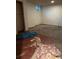 Image of unfinished basement room with stained floors and exposed electrical wiring at 3150 W 134Th Ave, Broomfield, CO 80020
