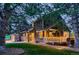 Charming exterior view of home with inviting front porch and mature landscaping at 9658 Coronado Ct, Parker, CO 80134