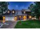 Two-story home boasting a manicured front lawn and a two-car garage with dormer windows at 9658 Coronado Ct, Parker, CO 80134