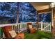 A cozy front porch featuring outdoor seating and view of the neighborhood at 9658 Coronado Ct, Parker, CO 80134