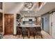 Well-appointed kitchen with a large island, pendant lighting, and stainless appliances at 9658 Coronado Ct, Parker, CO 80134