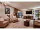 Cozy living room with wood accents, fireplace, and mounted guitars at 9658 Coronado Ct, Parker, CO 80134