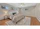 Comfortable bedroom with hardwood floors, ample natural light, and a cozy atmosphere at 3905 S Jersey St, Denver, CO 80237