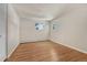 Bedroom with hardwood floors and natural light at 3905 S Jersey St, Denver, CO 80237