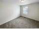 Small bedroom with carpet and natural light from one window at 762 Penn Rd, Elizabeth, CO 80107