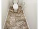 Powder room with tile floor and modern toilet at 762 Penn Rd, Elizabeth, CO 80107