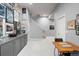 Finished basement with gray cabinets along one wall and stairs leading to the upper level at 254 Lead Queen Dr, Castle Rock, CO 80108