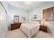 Bright bedroom with a comfortable bed, wooden furniture, and natural light, offering a serene retreat at 254 Lead Queen Dr, Castle Rock, CO 80108