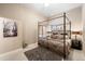 Cozy bedroom with a four-poster bed, soft lighting, and neutral tones creating a relaxing atmosphere at 254 Lead Queen Dr, Castle Rock, CO 80108