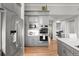 A kitchen is shown with stainless steel appliances and gray cabinetry at 254 Lead Queen Dr, Castle Rock, CO 80108