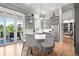 This is a spacious kitchen featuring gray cabinetry, stainless steel appliances, and a kitchen island at 254 Lead Queen Dr, Castle Rock, CO 80108