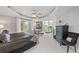 This is a bedroom with tray ceilings and large windows at 254 Lead Queen Dr, Castle Rock, CO 80108
