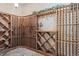 Custom wine cellar with wooden racks and stone flooring, perfect for storing and displaying a curated collection at 254 Lead Queen Dr, Castle Rock, CO 80108