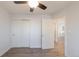 Bedroom with closet and view into the living area at 1476 W Dakota Ave, Denver, CO 80223