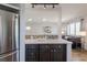 Well-designed kitchen with a view into the adjacent living spaces, ample counter space at 1476 W Dakota Ave, Denver, CO 80223