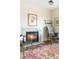 Beautiful fireplace with mantle, decor, and comfortable seating area at 2432 S Newport St, Denver, CO 80224