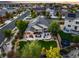 Aerial shot of a home with manicured lawn, patio, and other outdoor amenities at 3107 S Nepal Way, Aurora, CO 80013