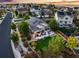 Aerial view of a home featuring a landscaped backyard with a patio and firepit area at 3107 S Nepal Way, Aurora, CO 80013