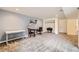 Spacious finished basement with carpeted floors, multiple work areas, and ample lighting at 461 S Kalispell Way # D, Aurora, CO 80017