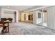 Finished basement featuring neutral carpet, walkout access, closet space and adjacent bathroom at 461 S Kalispell Way # D, Aurora, CO 80017