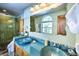 Bright bathroom with double sinks, modern fixtures, and a glass-enclosed shower for a luxurious feel at 107 Elk Dr, Evergreen, CO 80439
