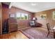 Bedroom featuring hardwood floors, an area rug, and a mountain view at 107 Elk Dr, Evergreen, CO 80439