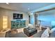 Relaxing living room featuring stylish furniture, ambient lighting, and a large television for entertainment at 107 Elk Dr, Evergreen, CO 80439