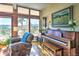 Cozy living room with lots of light, a comfy chair, and nice view at 107 Elk Dr, Evergreen, CO 80439