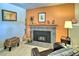 Cozy living room featuring a modern fireplace, comfortable seating, and stylish decor for relaxation at 107 Elk Dr, Evergreen, CO 80439
