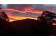 Beautiful view of the mountains during a vivid sunset at 107 Elk Dr, Evergreen, CO 80439