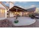 Backyard patio area with custom pergola is perfect for outdoor living and entertaining at 8187 N Pinewood Dr, Castle Rock, CO 80108