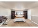 Basement bedroom with natural light and built in bookcases at 8187 N Pinewood Dr, Castle Rock, CO 80108