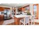 Kitchen with a large island, stainless steel appliances, and bar stool seating at 8187 N Pinewood Dr, Castle Rock, CO 80108