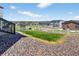 Backyard view with a white fence and a glimpse of neighboring homes at 5336 Trails Edge Ln, Castle Rock, CO 80104