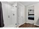 A bathroom with a glass shower stall and access to the primary bedroom at 5336 Trails Edge Ln, Castle Rock, CO 80104