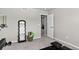 Versatile exercise space with mirror, weights, and room for yoga or other fitness activities at 5336 Trails Edge Ln, Castle Rock, CO 80104