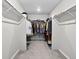 Spacious walk-in closet with ample storage and custom shelving for organization at 5336 Trails Edge Ln, Castle Rock, CO 80104