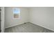 Bedroom with plush carpeting and natural light from the window at 9374 Quartz St, Arvada, CO 80007