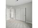 Bedroom with gray carpet, neutral walls, and a sliding door closet at 9374 Quartz St, Arvada, CO 80007