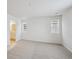 Main bedroom with carpet and en-suite bathroom access at 811 Goodrich Peak St, Erie, CO 80516